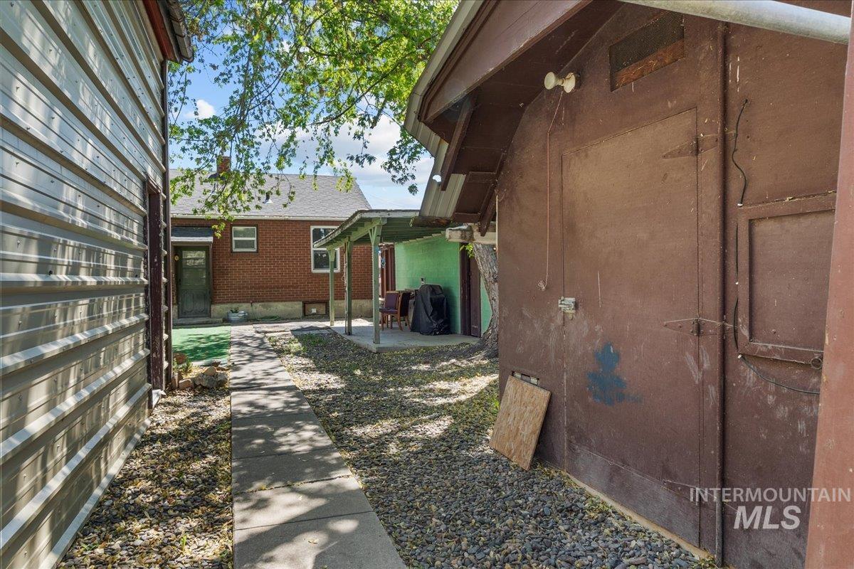 1958 East 1775 South Gooding, ID 83330 - Photo 45 of 49 Concrete pathway with gravel borders