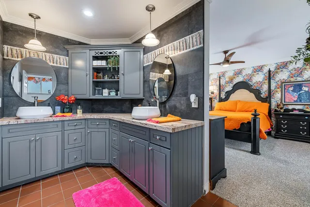 a bathroom with a sink and a mirror