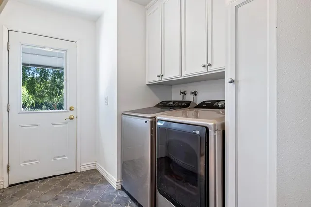 a kitchen with granite countertop lots of counter top space