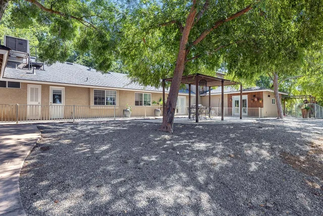 an aerial view of a house with garden