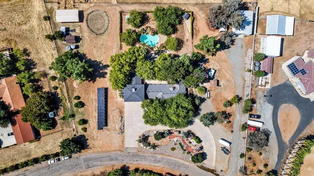 a bedroom with a bed and a mirror