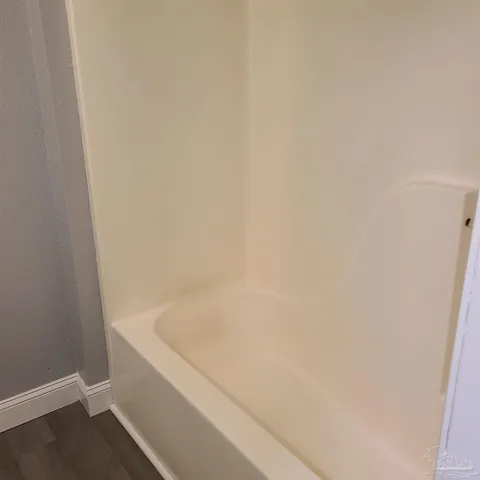 a bathroom with a bathtub