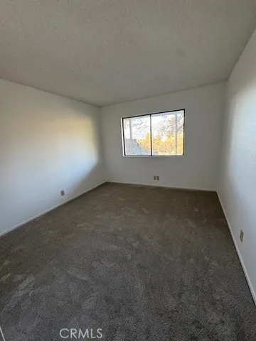 a balcony with wooden floor