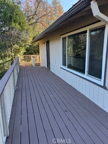 a balcony with an outdoor space