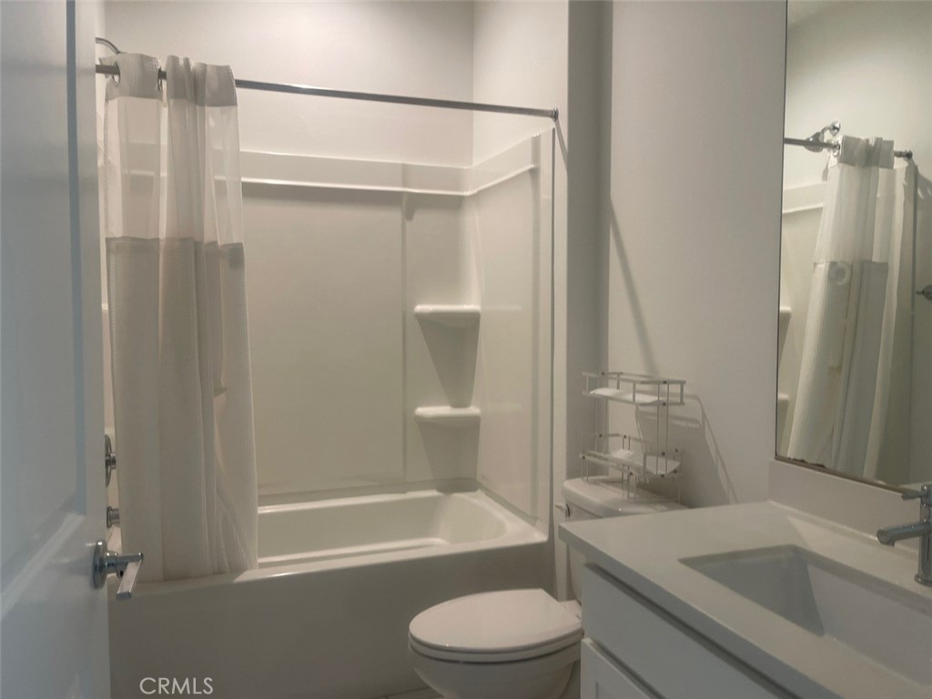 170 Episode Irvine, CA 92618 - Photo 19 of 63 a bathroom with a granite countertop bathtub shower sink vanity and toilet