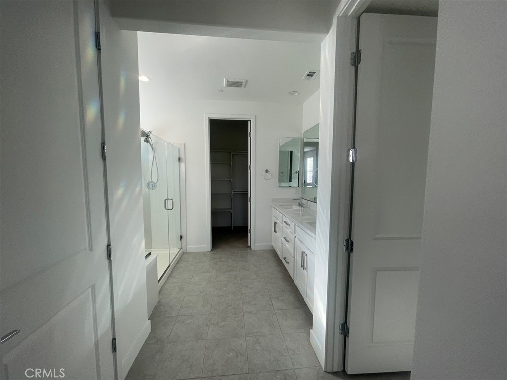 170 Episode Irvine, CA 92618 - Photo 27 of 63 a view of a hallway with a door
