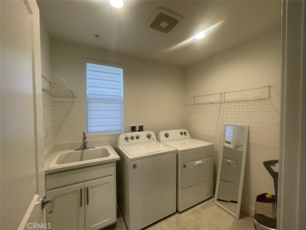 170 Episode Irvine, CA 92618 - Photo 30 of 63 a utility room with dryer and washer