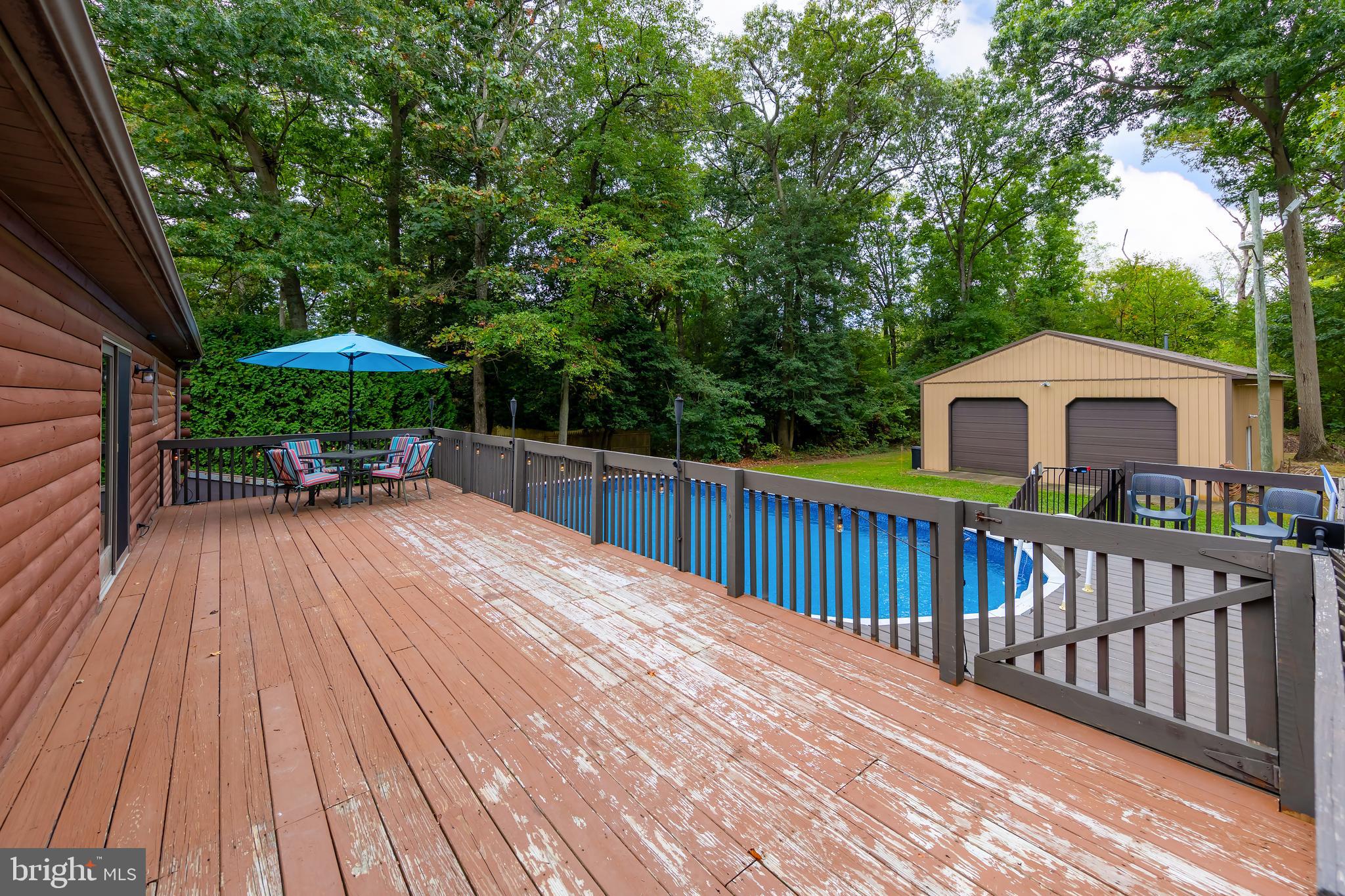 18 Dubois Road Bridgeton, NJ 08302 - Photo 24 of 37 Large deck overlooking the pool & private setting!