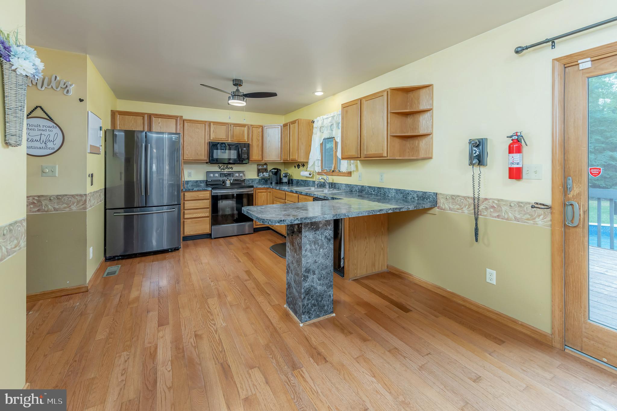 18 Dubois Road Bridgeton, NJ 08302 - Photo 7 of 37 Slate countertops with an island in the kitchen!