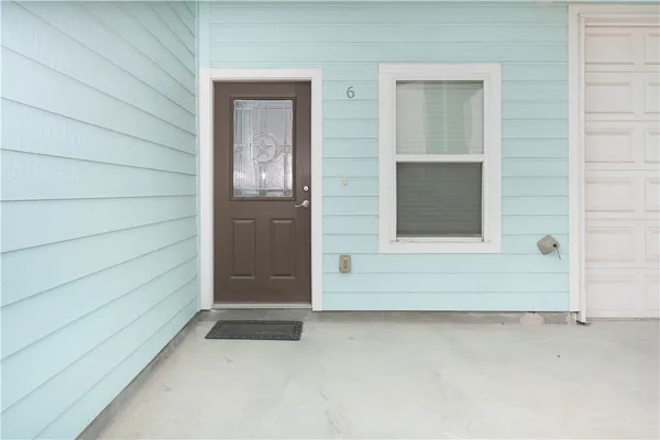 a room with toys and dresser with wooden floor