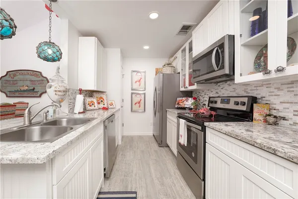 a room with furniture and a chandelier