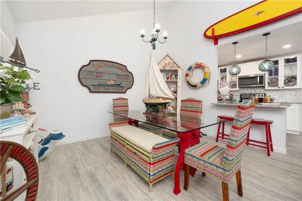 a bathroom with a sink vanity mirror and shower
