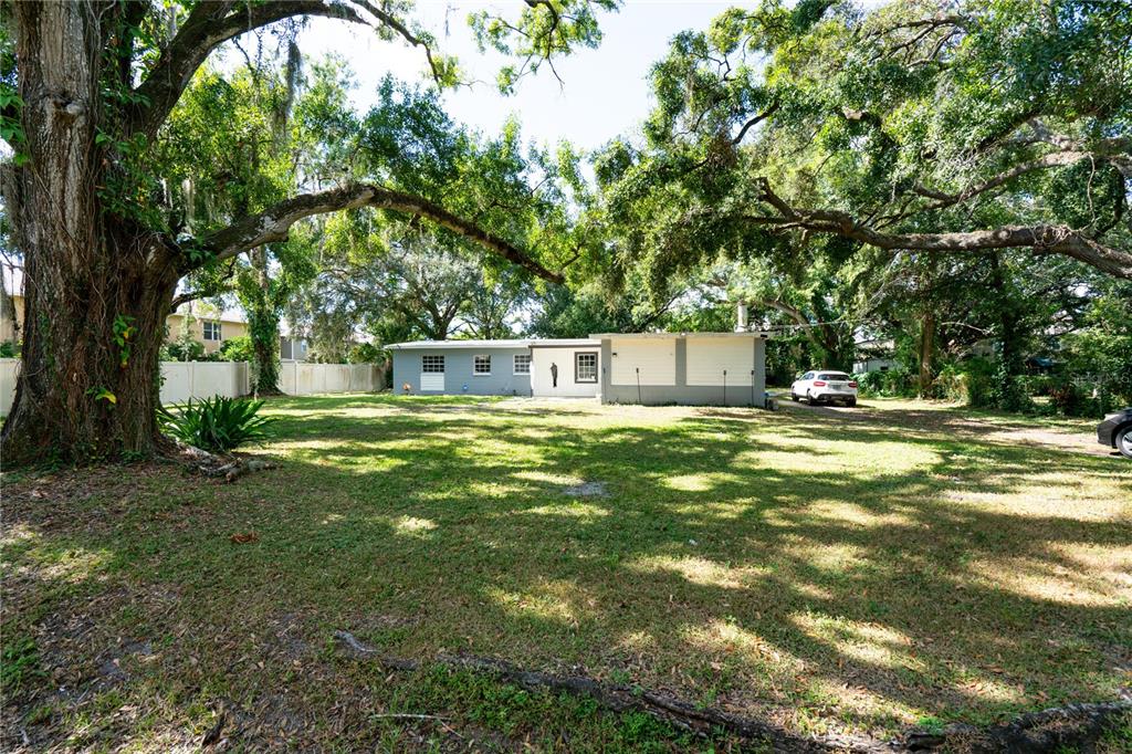 3102 Williams Road Brandon, FL 33510 - Photo 5 of 29 a swimming pool with outdoor seating and yard
