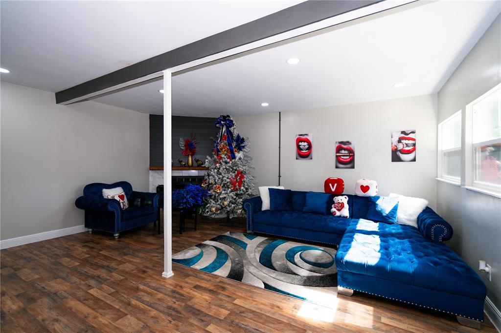 3102 Williams Road Brandon, FL 33510 - Photo 6 of 29 a living room with furniture and a wooden floor