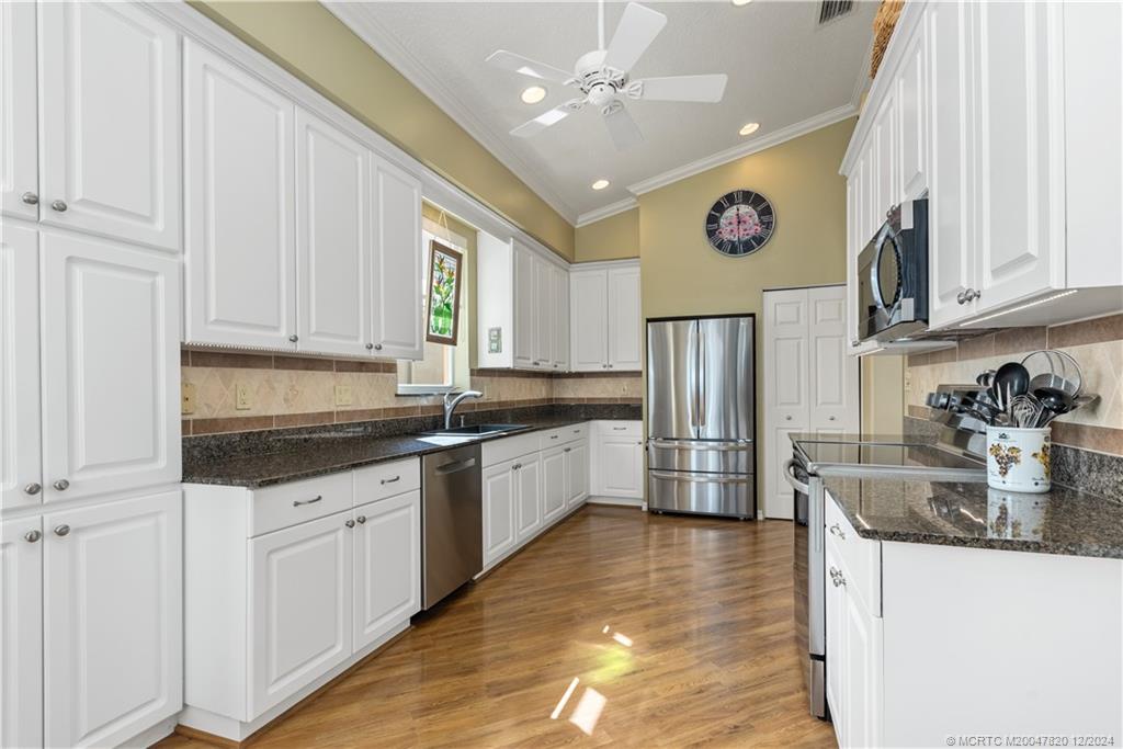 2031 Northwest Marsh Rabbit Lane Stuart, FL 34994 - Photo 13 of 25 Kitchen