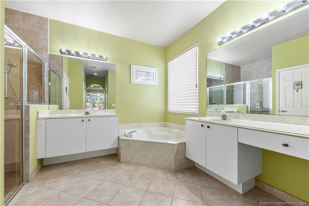 2031 Northwest Marsh Rabbit Lane Stuart, FL 34994 - Photo 18 of 25 Main Bathroom