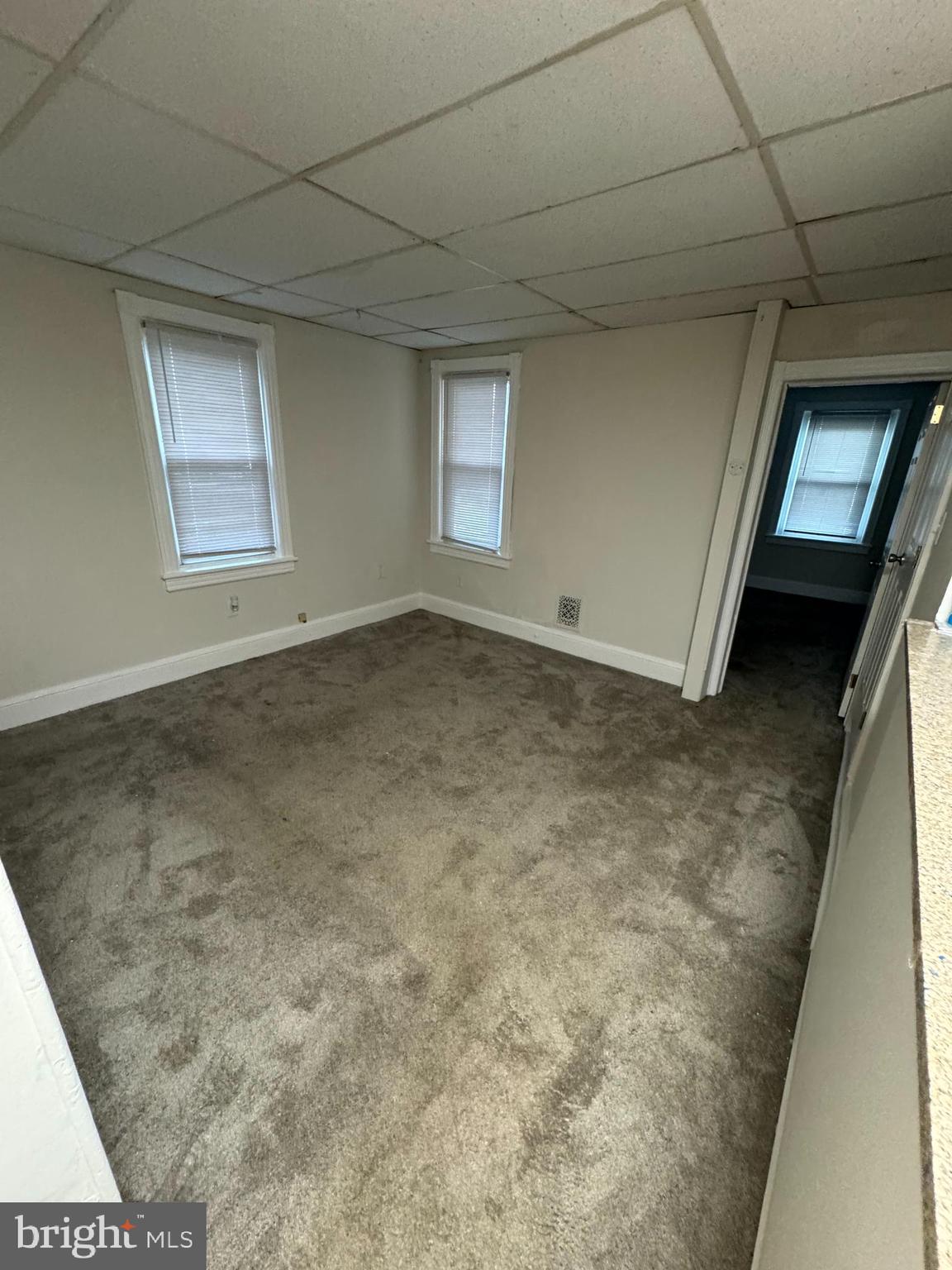 317-319 Walnut Street Delanco, NJ 08075 - Photo 7 of 10 a view of an empty room and window