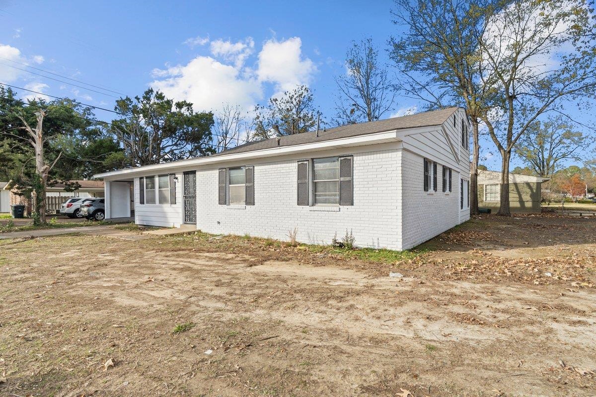 4948 Knight Arnold Road Memphis, TN 38118 - Photo 25 of 27 View of front facade featuring brick siding