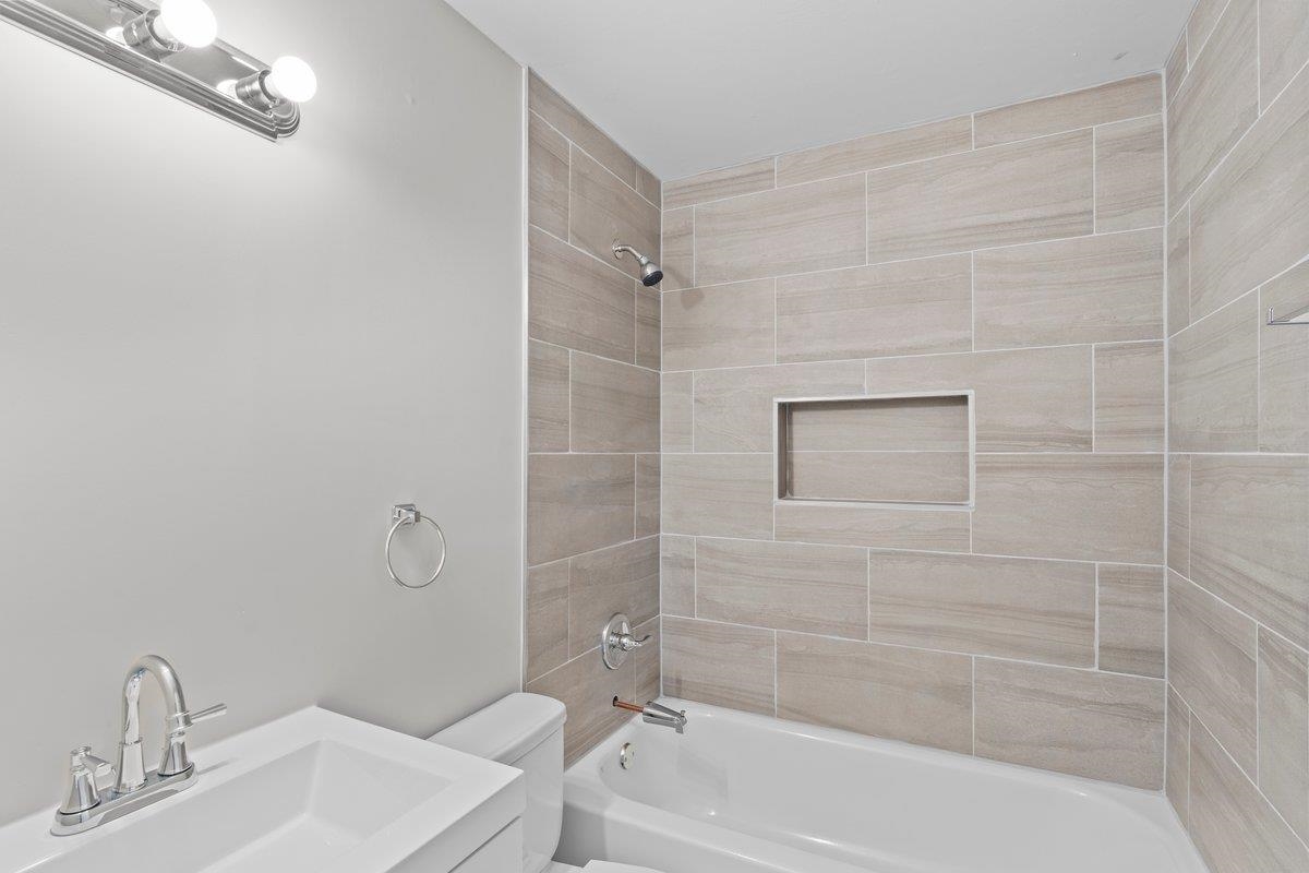 4948 Knight Arnold Road Memphis, TN 38118 - Photo 8 of 27 Full bath featuring shower / bath combination and vanity