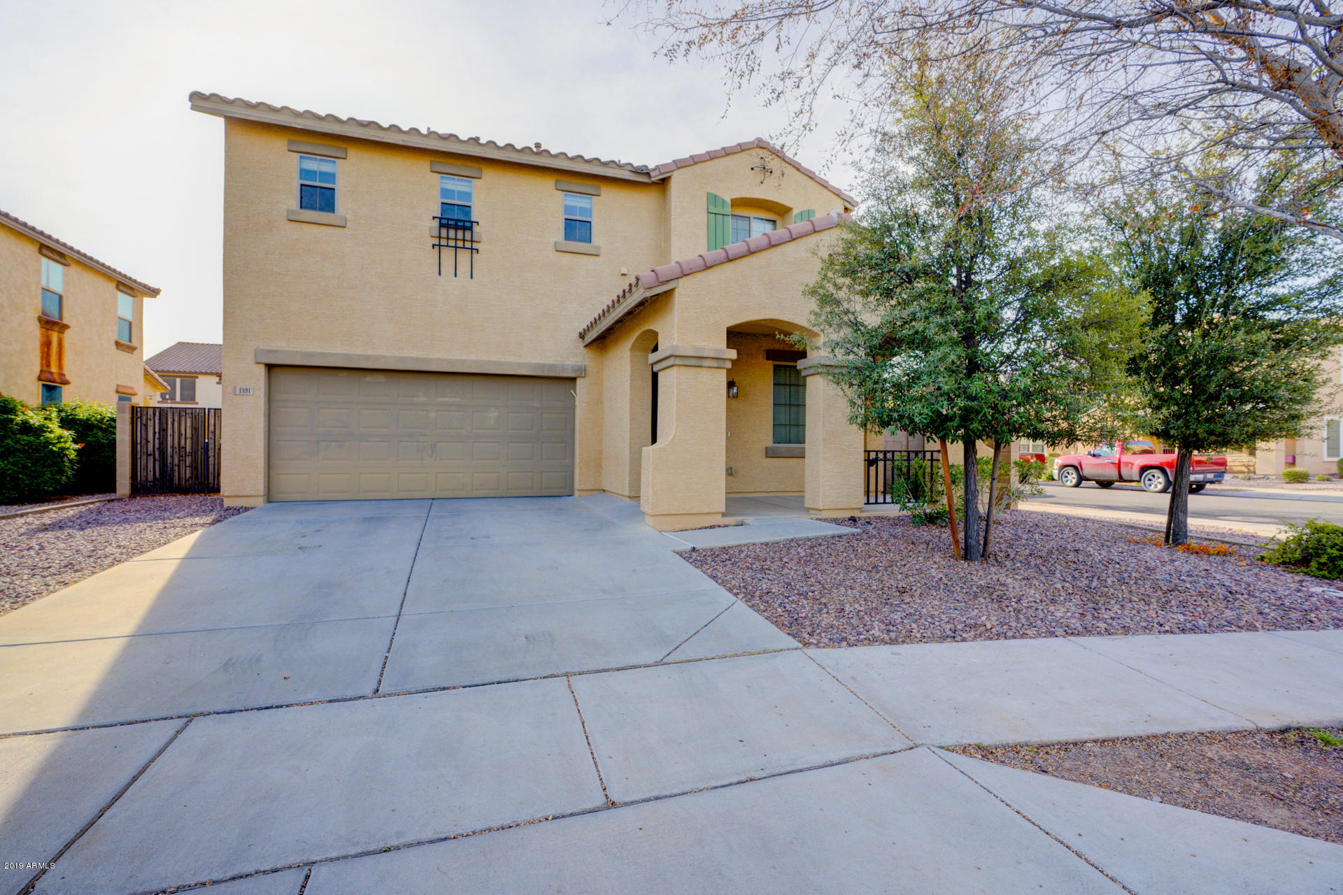 1891 South Racine Lane Gilbert, AZ 85295 - Photo 1 of 35 a view of a parking space in a house