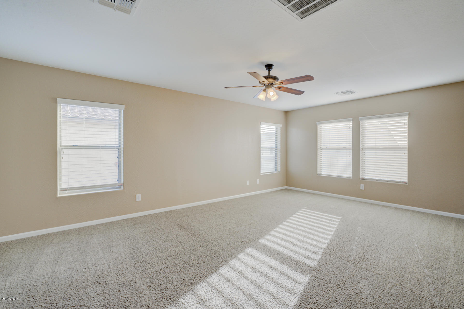 1891 South Racine Lane Gilbert, AZ 85295 - Photo 12 of 35 a view of an empty room with a window