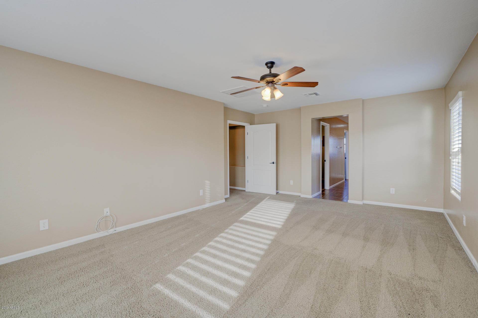 1891 South Racine Lane Gilbert, AZ 85295 - Photo 13 of 35 a view of an empty room with a window