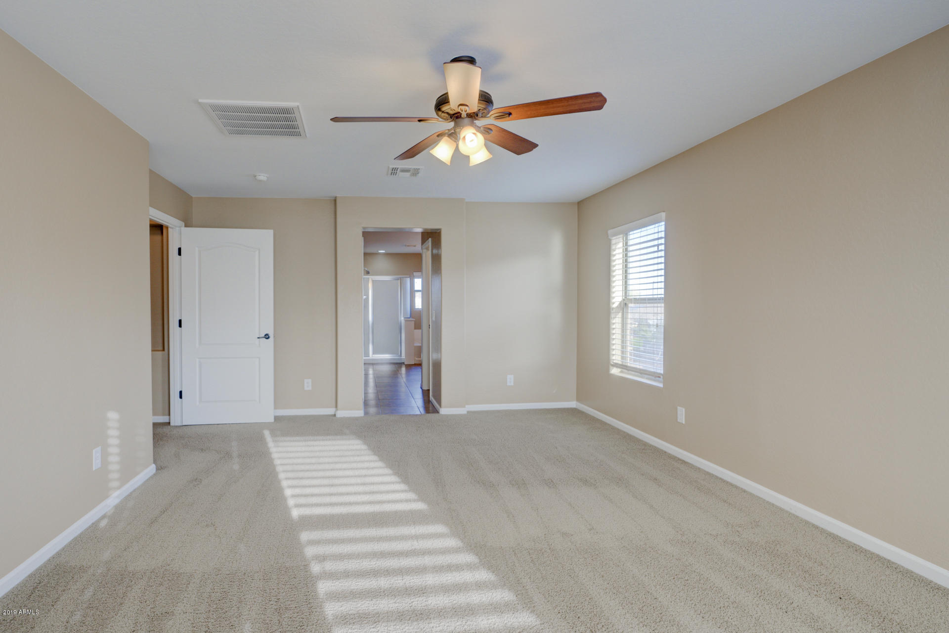 1891 South Racine Lane Gilbert, AZ 85295 - Photo 14 of 35 a view of an empty room with a window