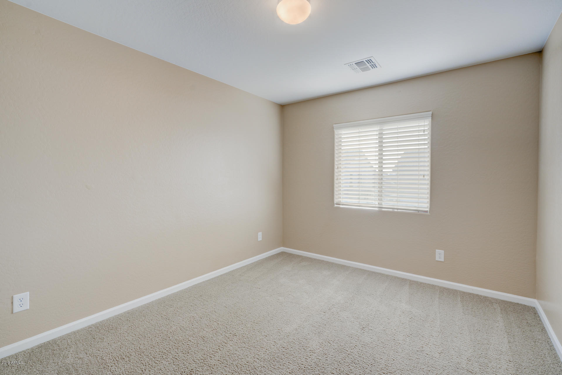 1891 South Racine Lane Gilbert, AZ 85295 - Photo 25 of 35 an empty room with a window