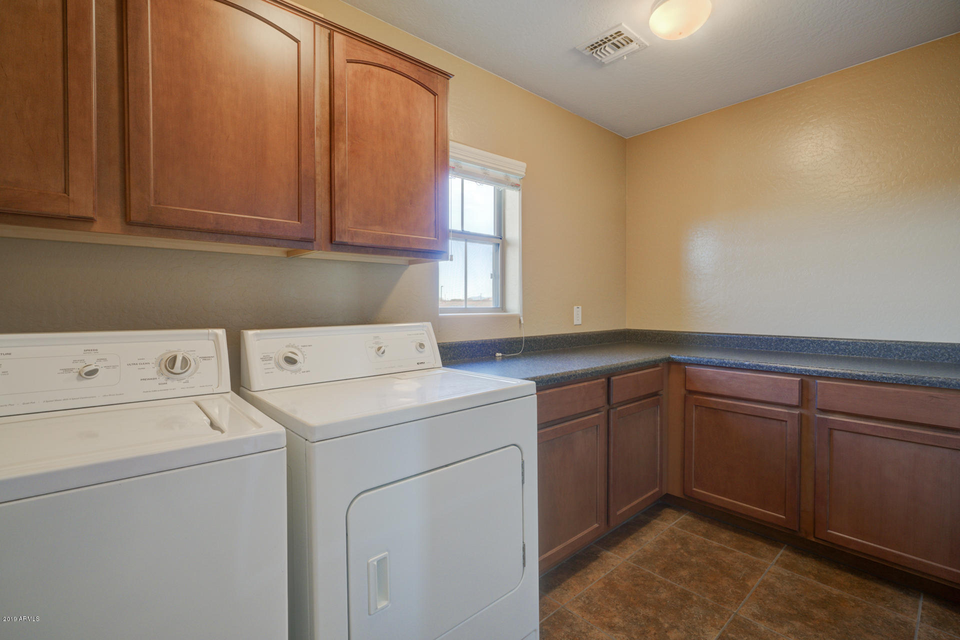 1891 South Racine Lane Gilbert, AZ 85295 - Photo 27 of 35 a utility room with dryer and washer