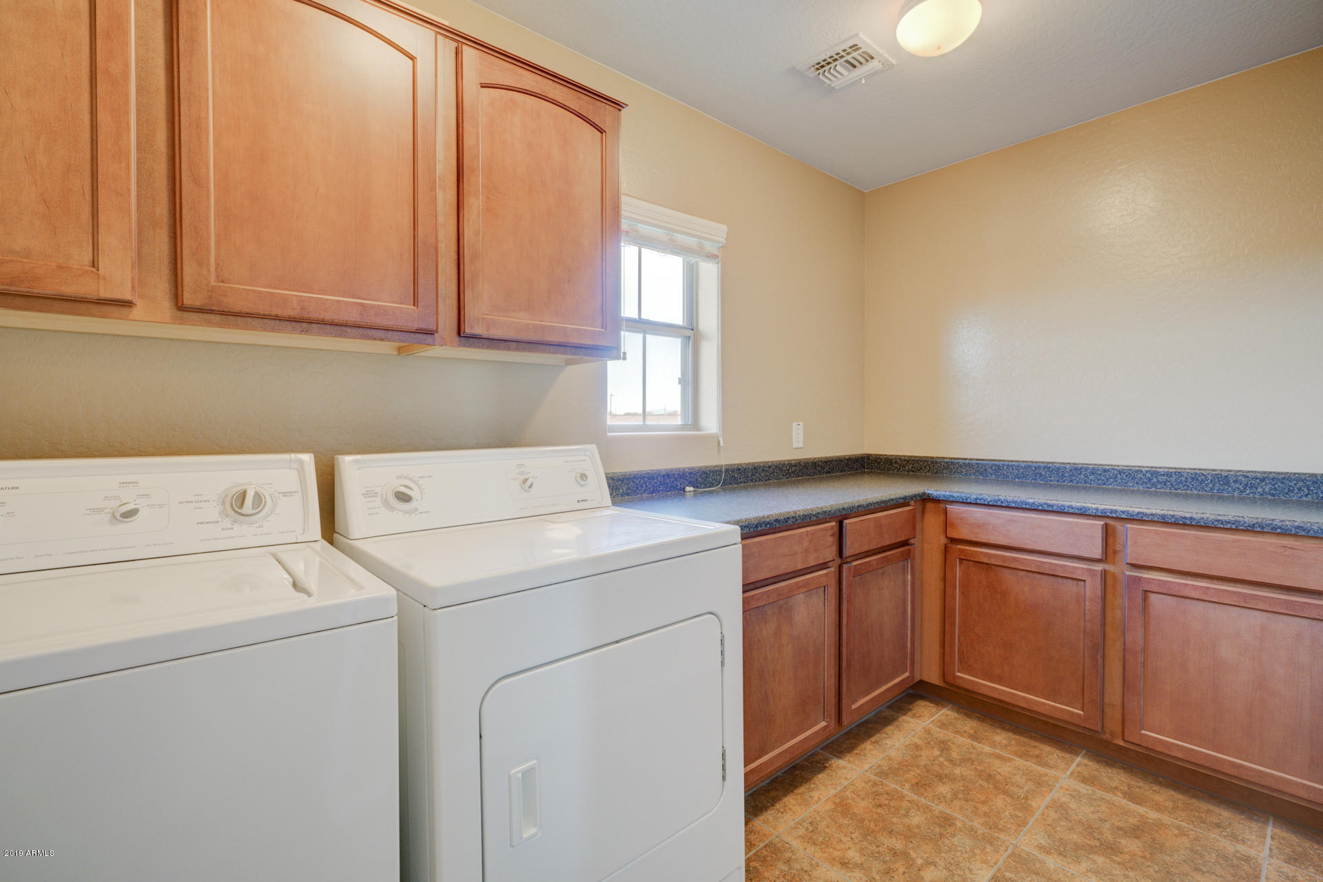 1891 South Racine Lane Gilbert, AZ 85295 - Photo 28 of 35 a utility room with dryer and washer