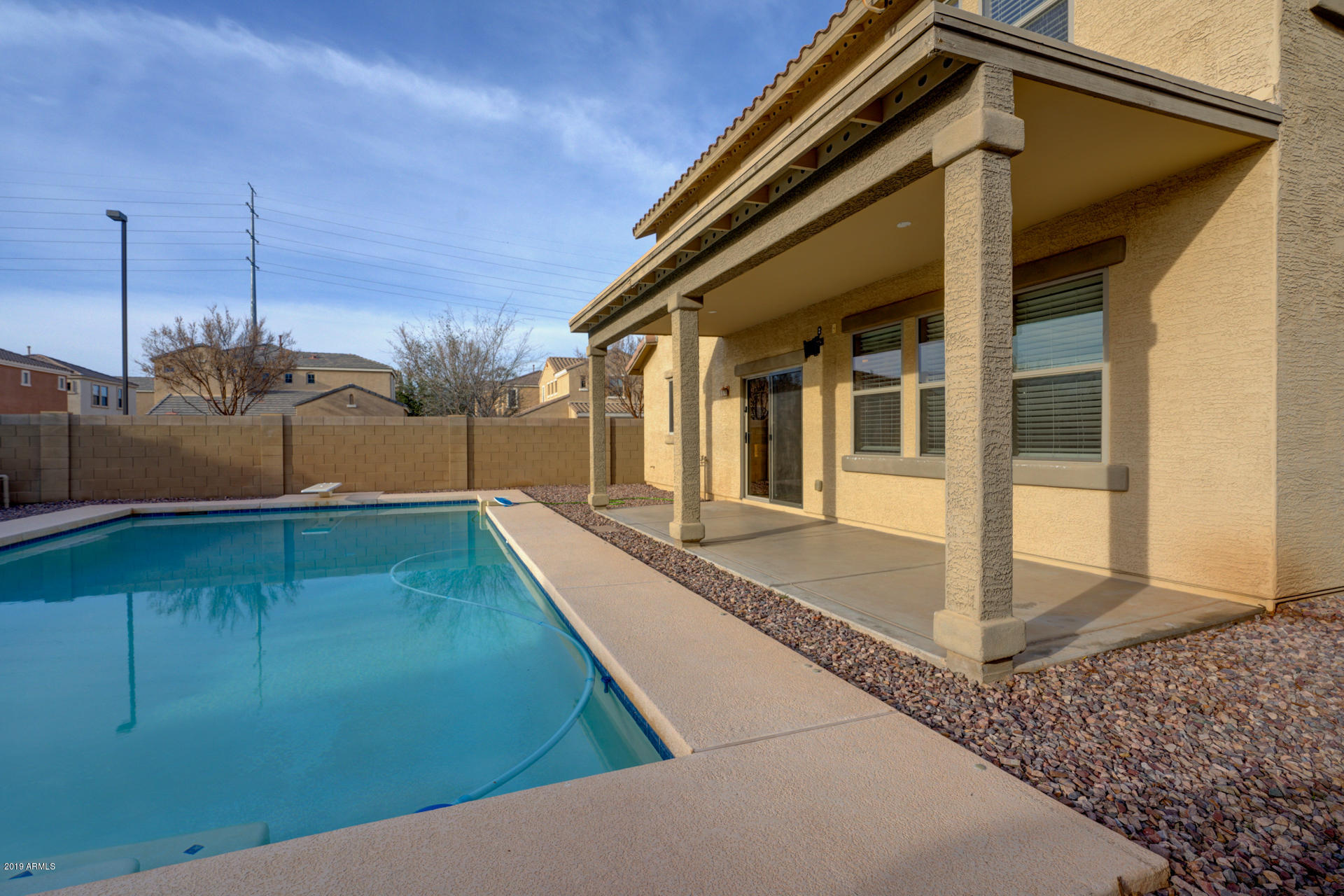 1891 South Racine Lane Gilbert, AZ 85295 - Photo 30 of 35 a view of a house with a backyard