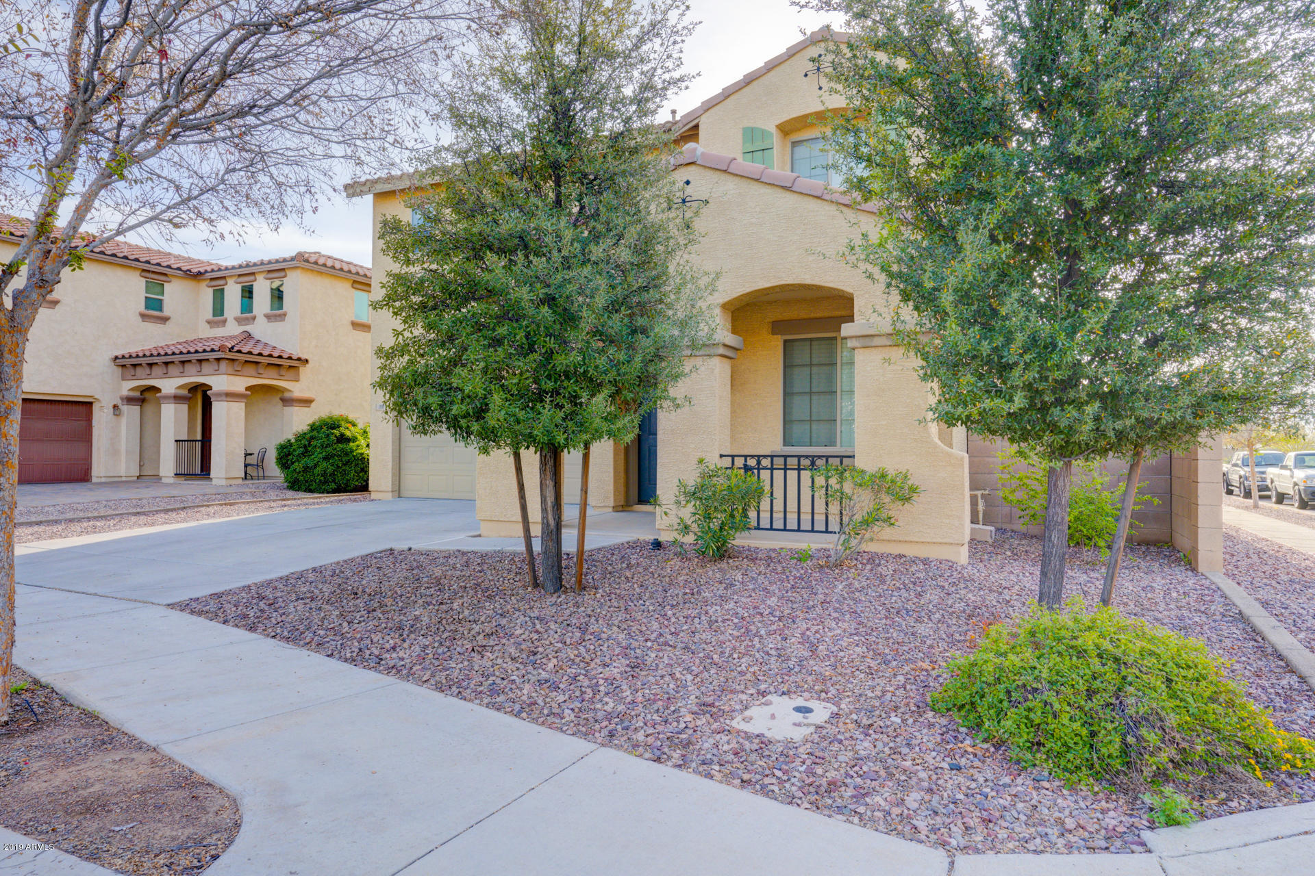 1891 South Racine Lane Gilbert, AZ 85295 - Photo 3 of 35 a front view of a house with garden
