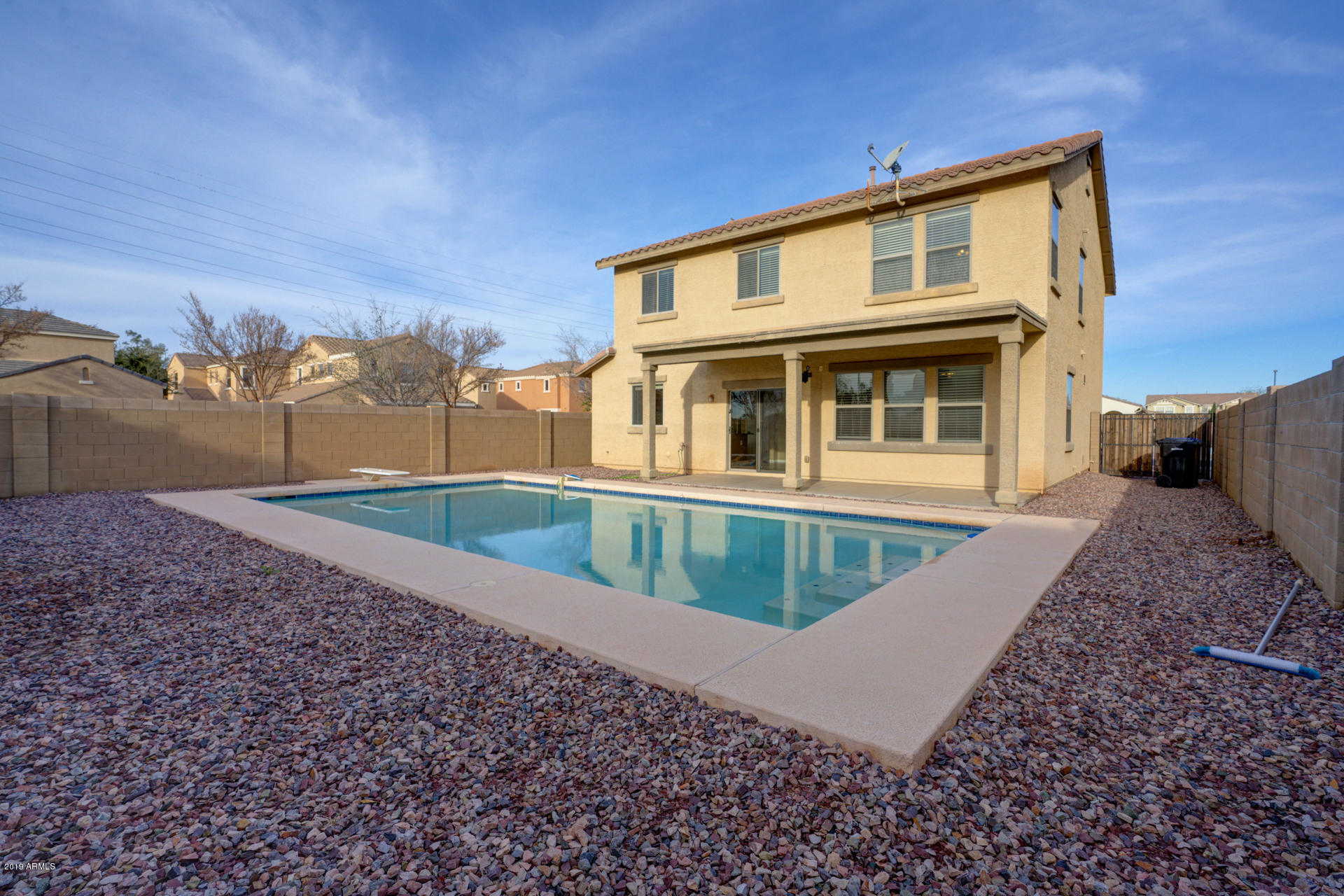 1891 South Racine Lane Gilbert, AZ 85295 - Photo 31 of 35 a view of a house with a yard
