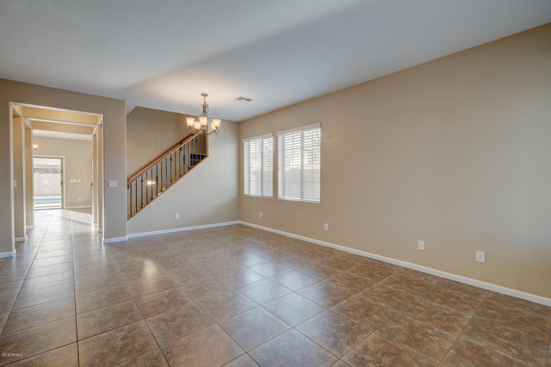 1891 South Racine Lane Gilbert, AZ 85295 - Photo 4 of 35 a view of an empty room with a window