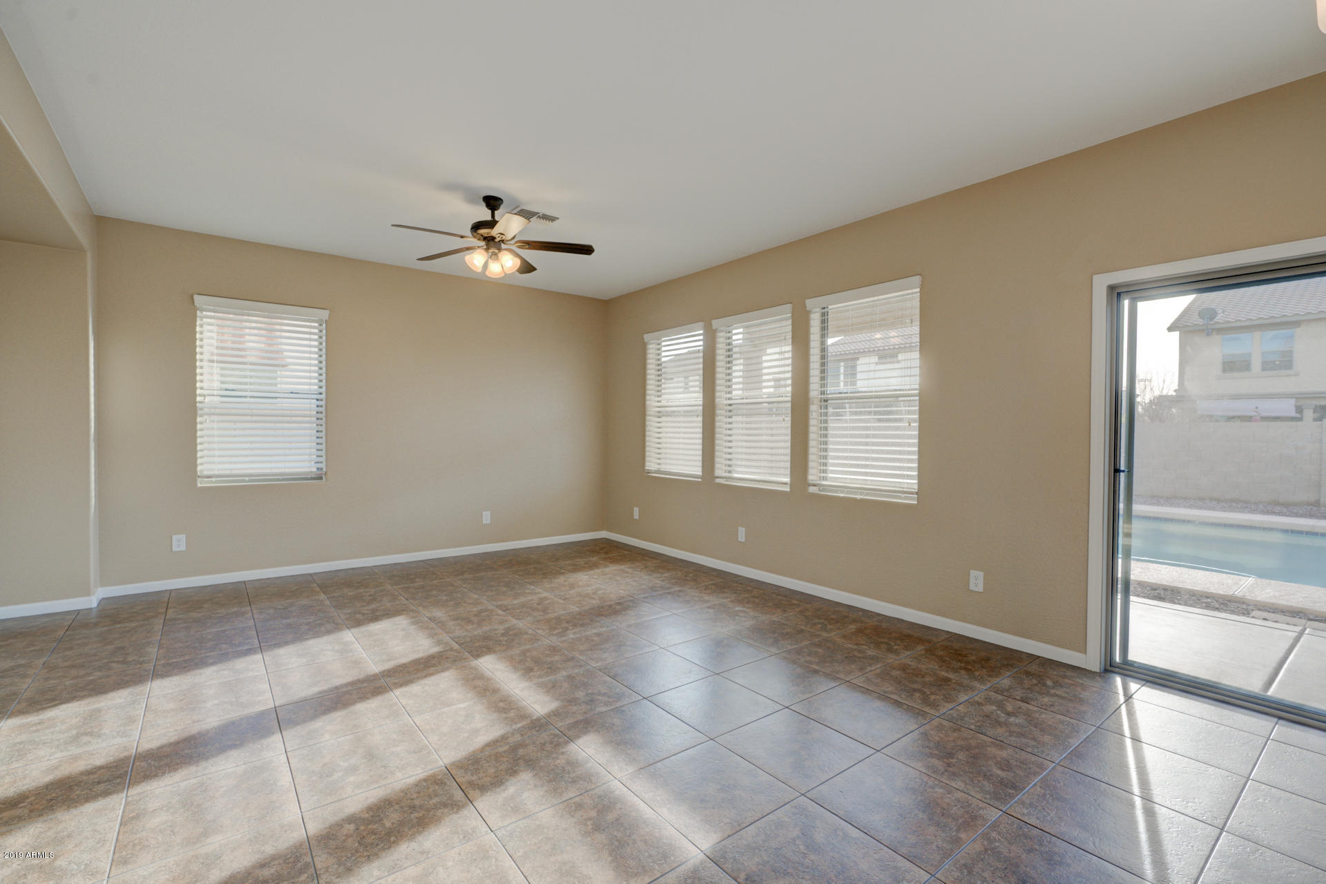 1891 South Racine Lane Gilbert, AZ 85295 - Photo 9 of 35 a view of an empty room with a window
