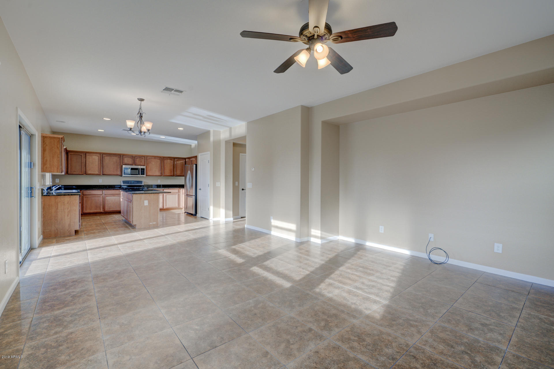 1891 South Racine Lane Gilbert, AZ 85295 - Photo 10 of 35 a view of a livingroom with a kitchen