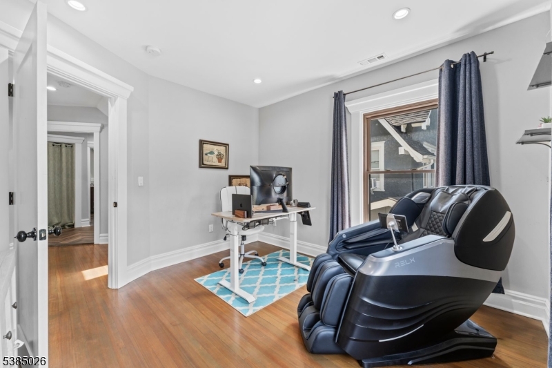 283 Orange Road Montclair, NJ 07042 - Photo 26 of 41 a work room with furniture and wooden floor