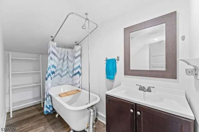 a bathroom with a sink and a bathtub