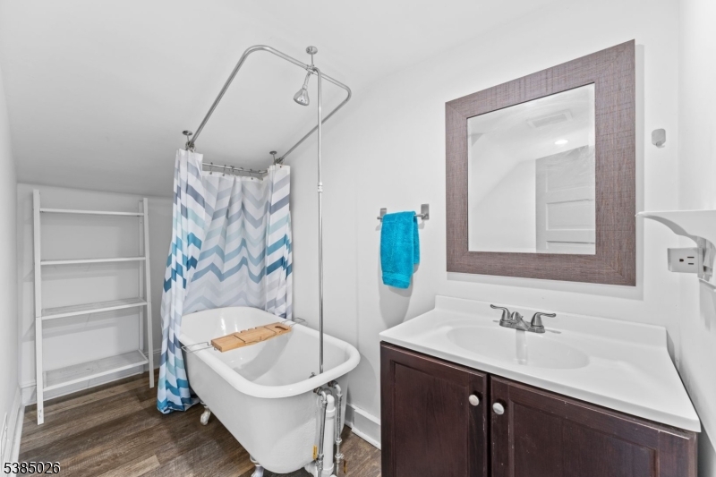 283 Orange Road Montclair, NJ 07042 - Photo 31 of 41 a bathroom with a sink and a bathtub