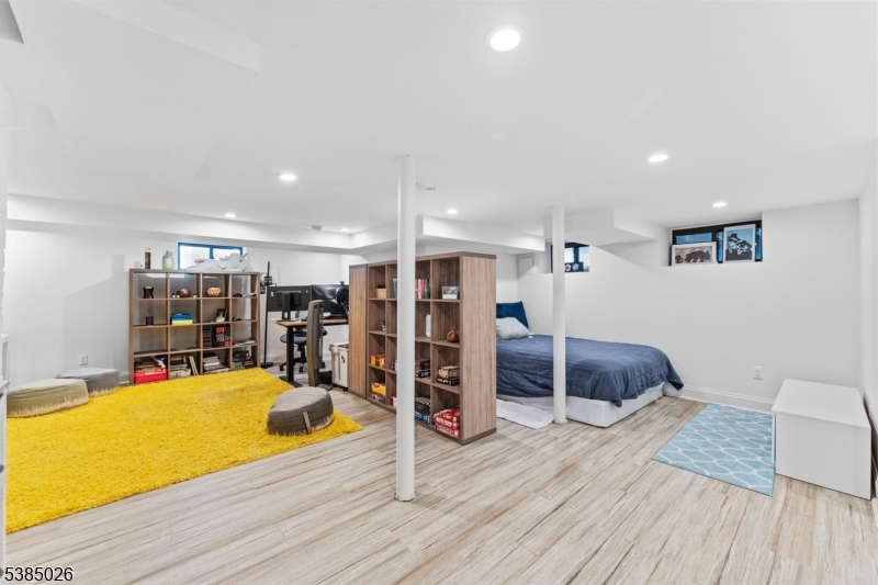 283 Orange Road Montclair, NJ 07042 - Photo 32 of 41 a living room with furniture and wooden floor
