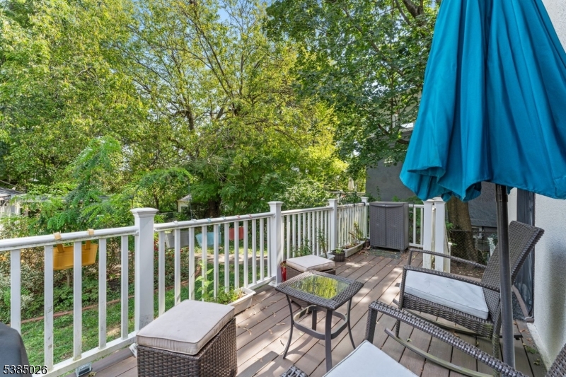 283 Orange Road Montclair, NJ 07042 - Photo 37 of 41 a view of a chair and table in the balcony