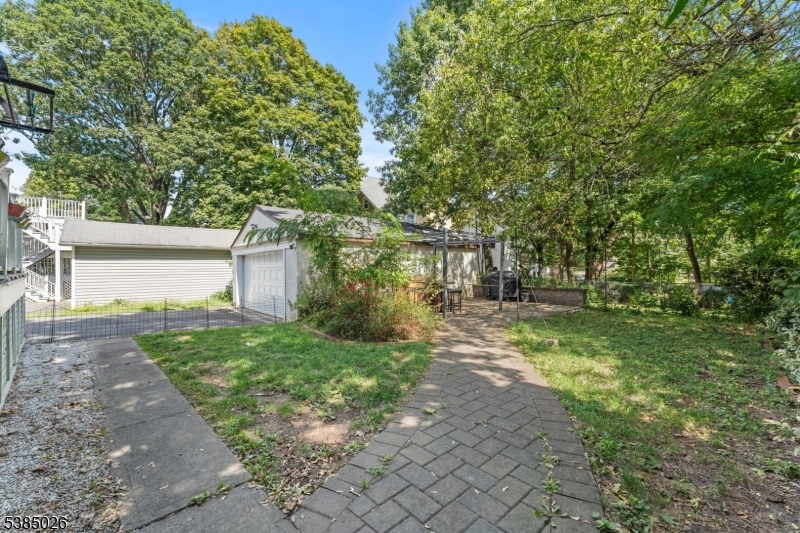 283 Orange Road Montclair, NJ 07042 - Photo 39 of 41 a view of a yard with plants and trees