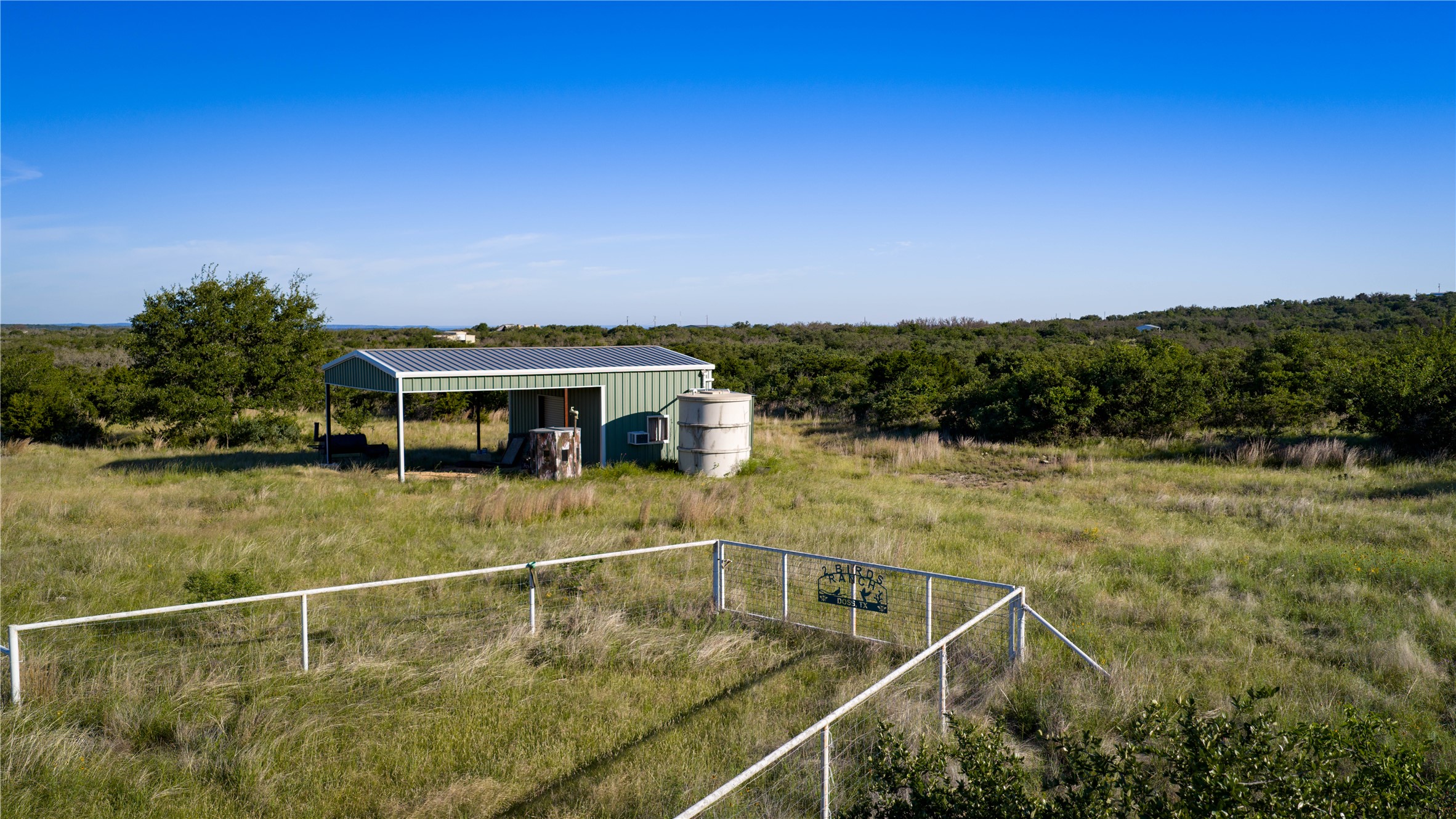 3276 Link Road Doss, TX 78618 - Photo 3 of 35 a view of a swimming pool with a lake view
