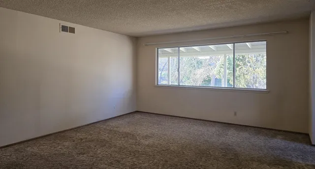 an empty room with a window