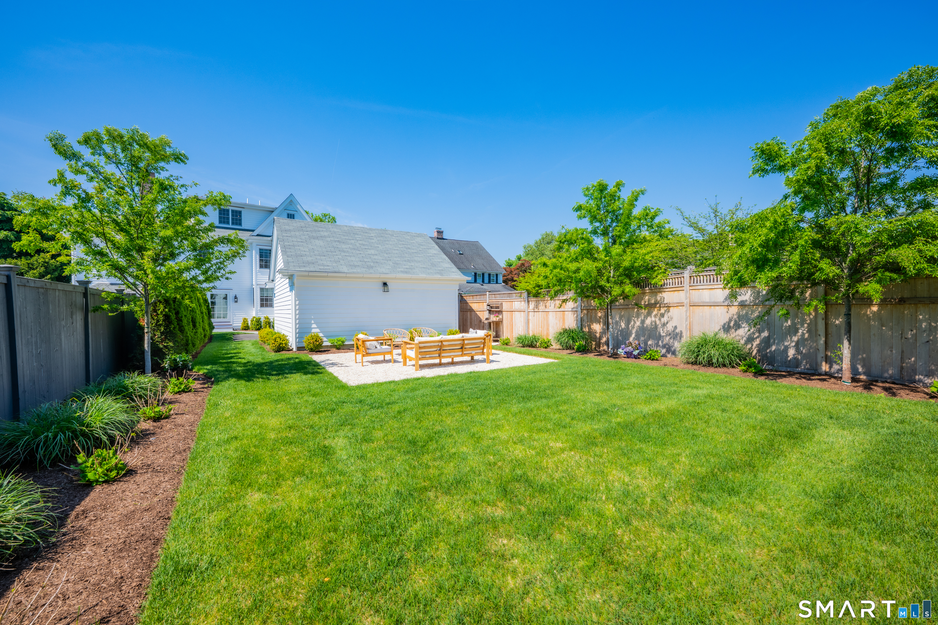 920 Old Post Road Fairfield, CT 06824 - Photo 36 of 40 The back yard area is amazing, very private and tranquil. This is where the pool can go, or just enjoy the lush grass and custom landscaping.