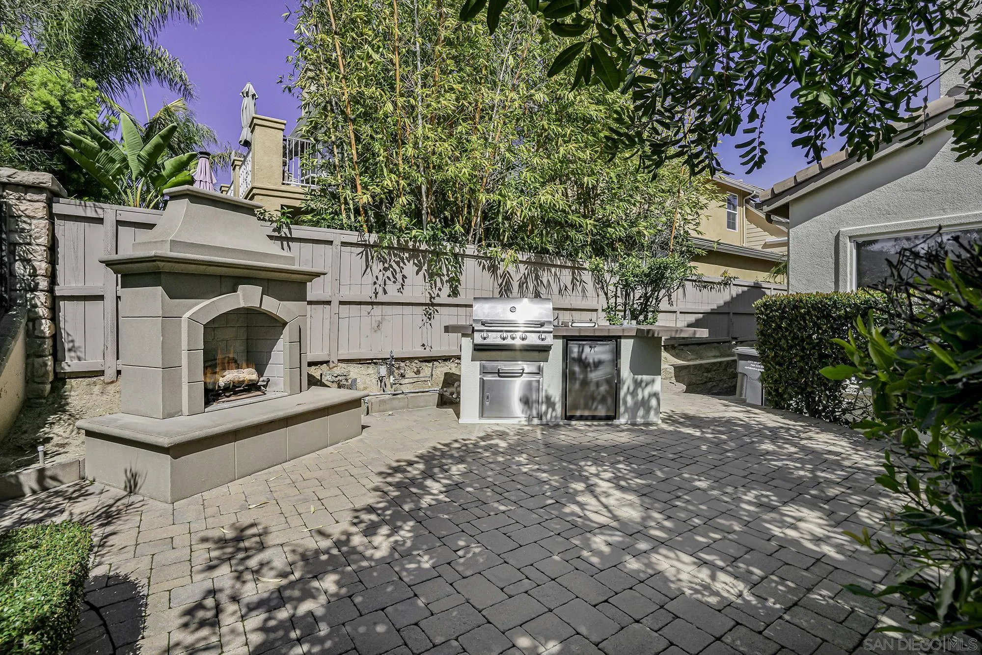 7065 Crystalline Drive Carlsbad, CA 92011 - Photo 23 of 26 a white building with a outdoor space