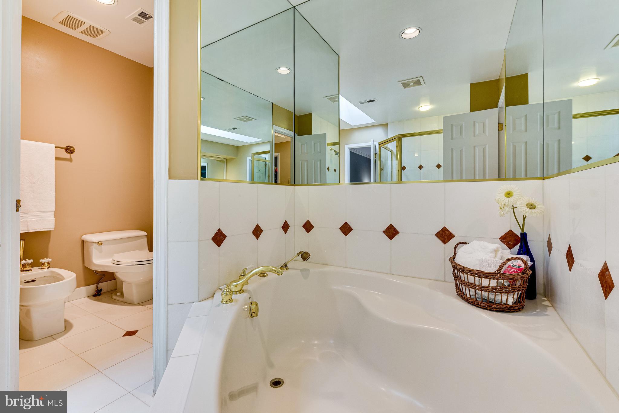 5815 Bent Twig Road McLean, VA 22101 - Photo 28 of 50 Corner soaking tub, bidet and water closet