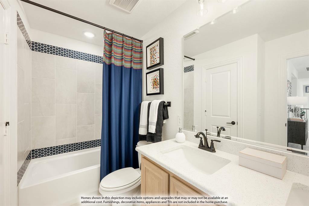 2014 Dundalk Lane Forney, TX 75126 - Photo 36 of 38 a bathroom with a sink a toilet and a bathtub