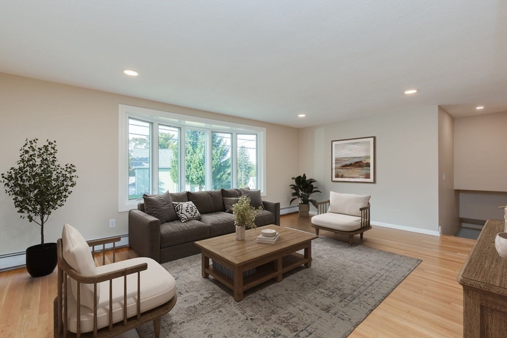 2 Oceanview Avenue Saugus, MA 01906 - Photo 13 of 41 a living room with furniture and a potted plant