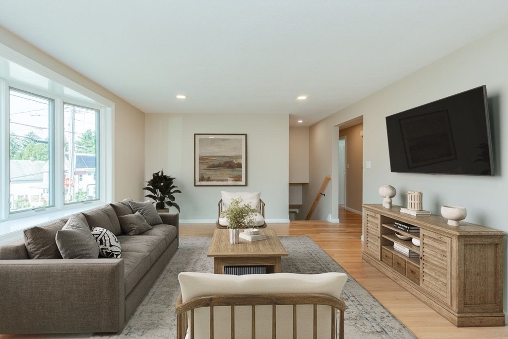 2 Oceanview Avenue Saugus, MA 01906 - Photo 14 of 41 a living room with furniture and a flat screen tv